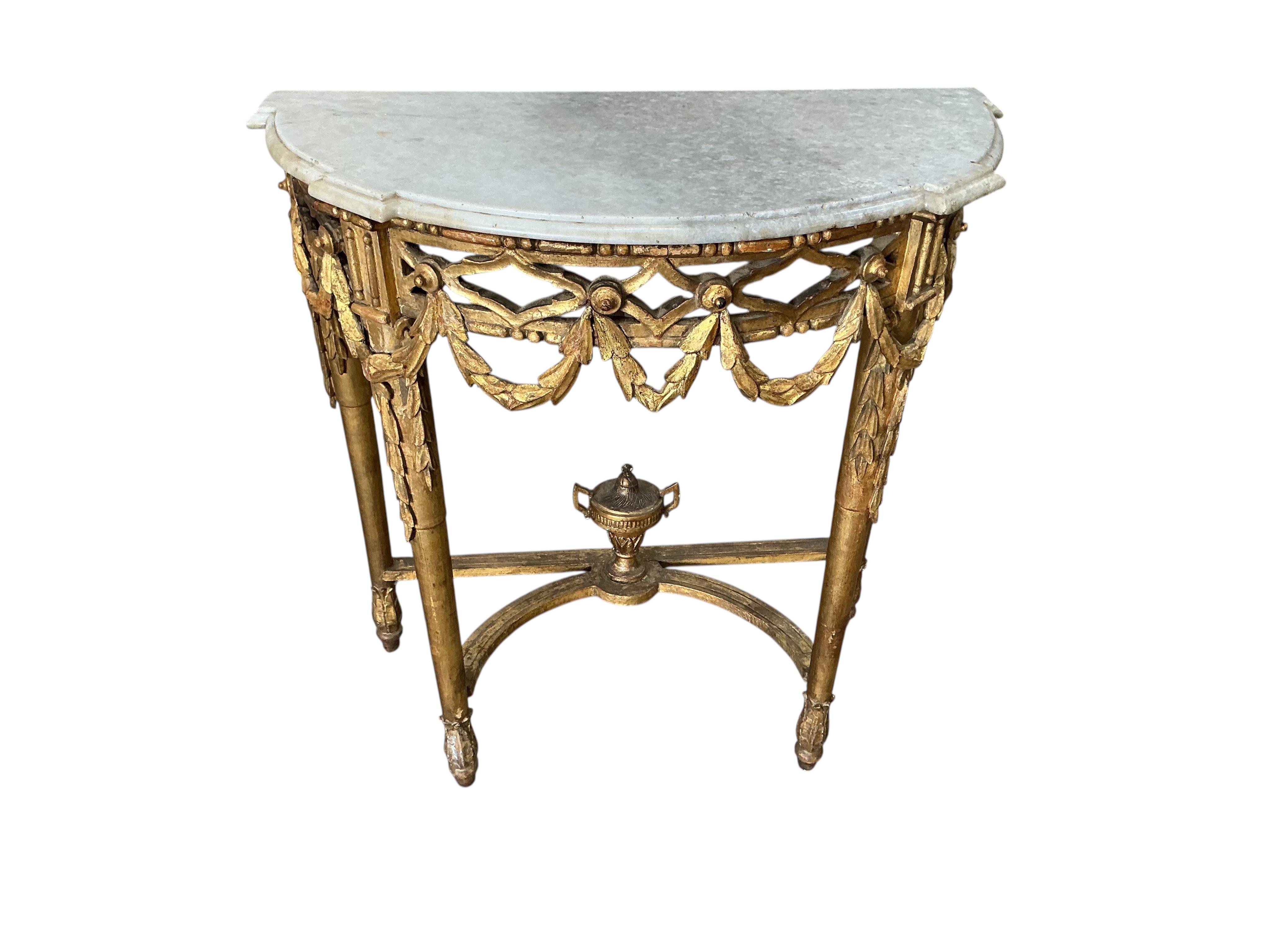 A 19th century Louis XVI style giltwood demi lune table with white marble top, width 82cm, depth 42cm, height 84cm